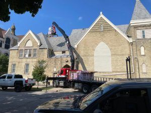 crane in front of building