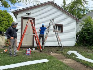 ladders in front of house